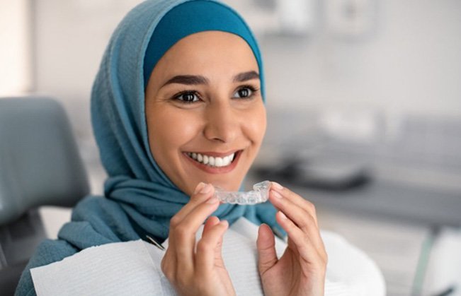 Patient in Kent smiling with Invisalign